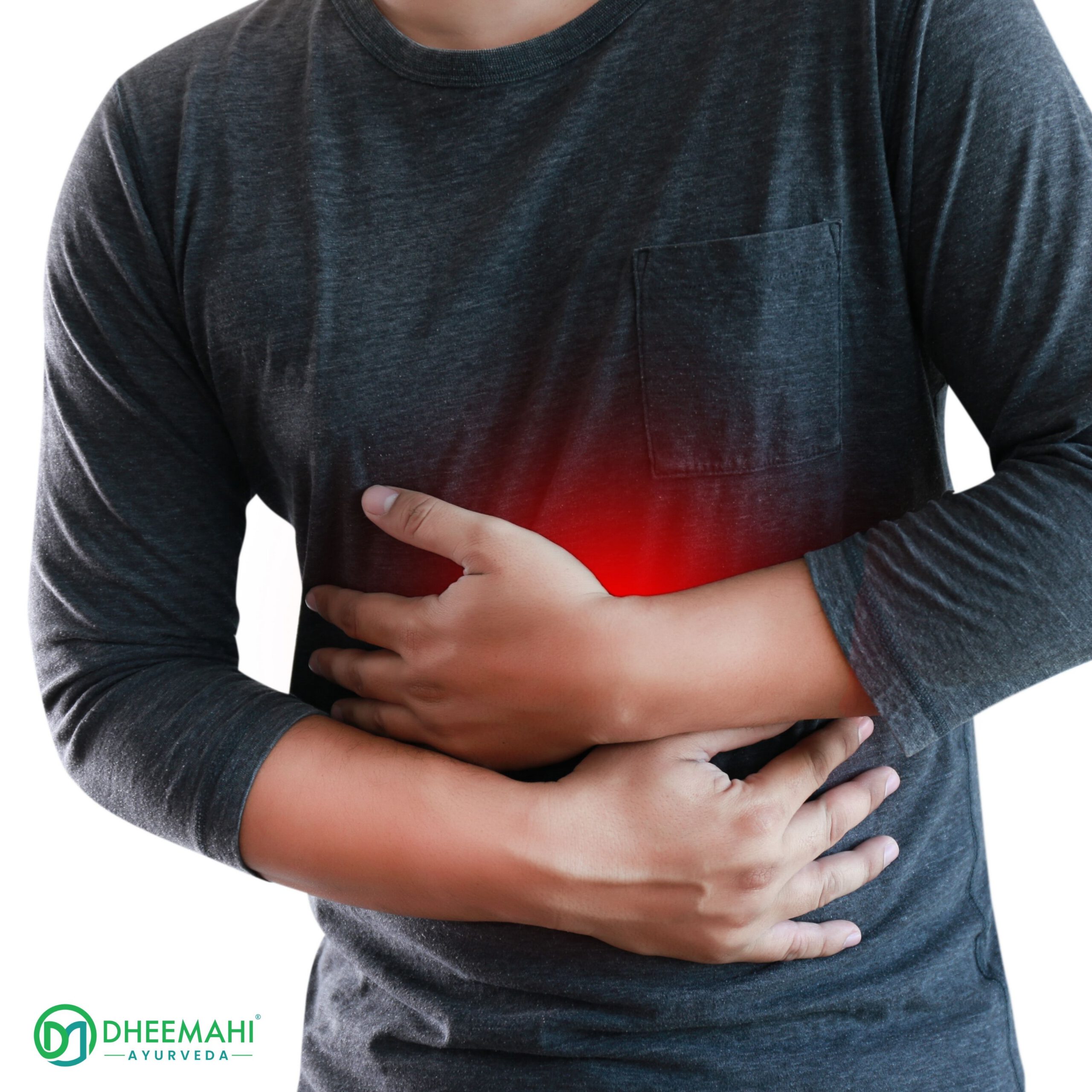Balanced Digestion Through Ayurvedic Treatment for Acidity A person wearing a dark grey shirt holding their stomach with both hands, showing signs of abdominal pain. A red highlight over the stomach area indicates discomfort or inflammation. The Dheemahi Ayurveda logo is visible in the bottom-left corner.
