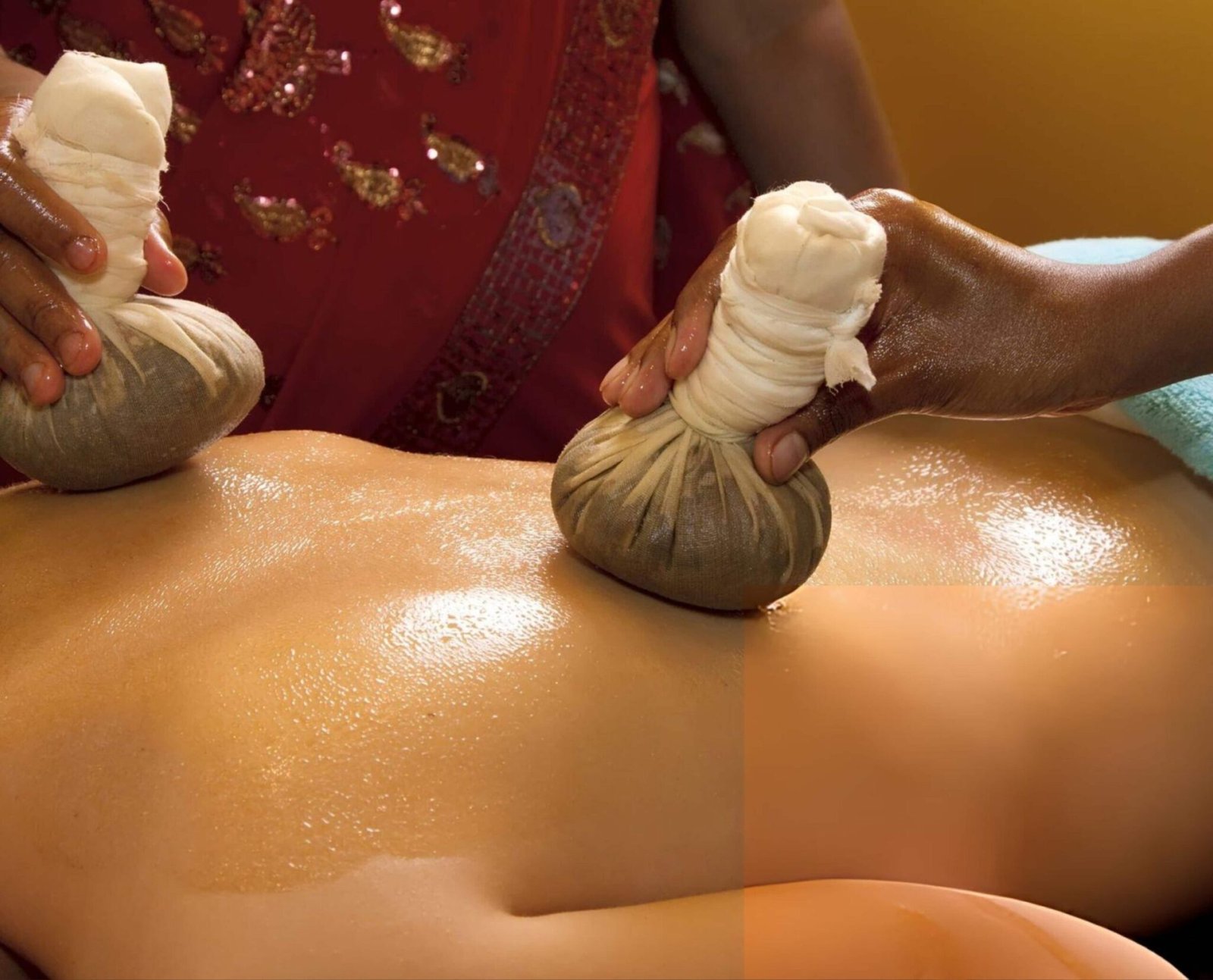 Njavarakizhi herbal rice pouch therapy as part of Ayurvedic treatment for stress and anxiety at an authentic Ayurveda wellness center in Kerala.