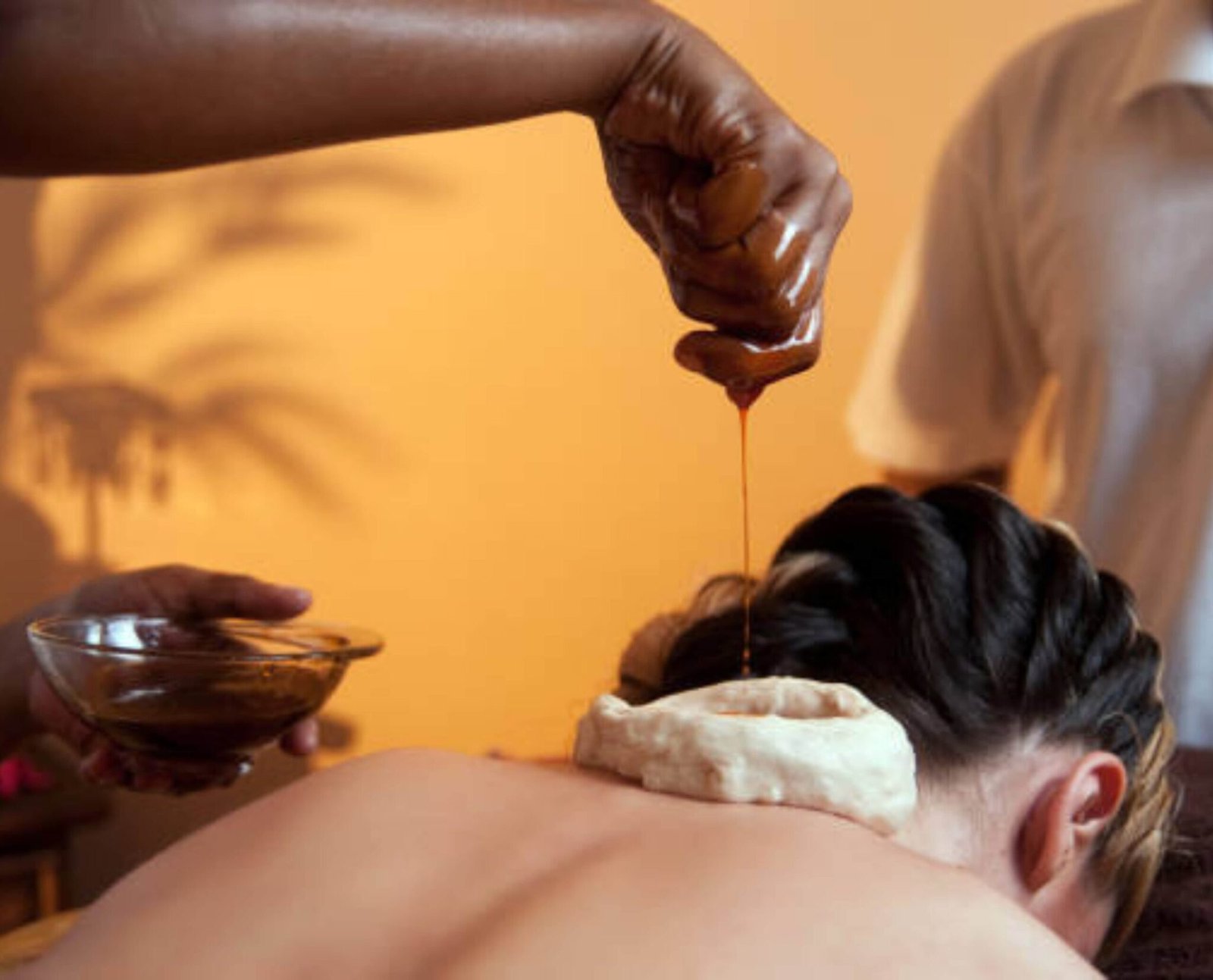 Kati Basti therapy with warm medicated herbal oil as part of Ayurvedic treatment for stress and anxiety in Kerala.