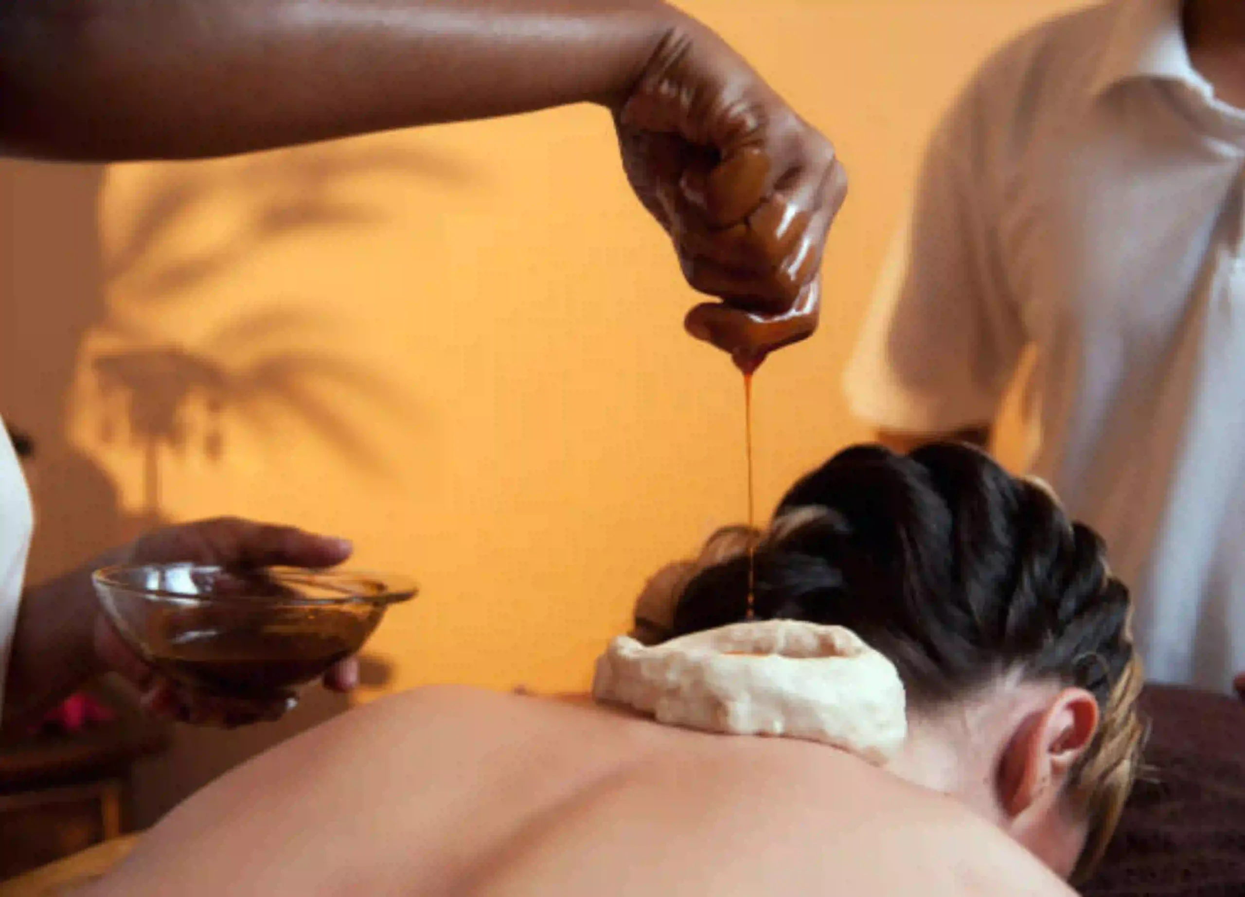 Karkidaka Chikitsa Package featuring traditional Ayurvedic oil therapy in Kerala