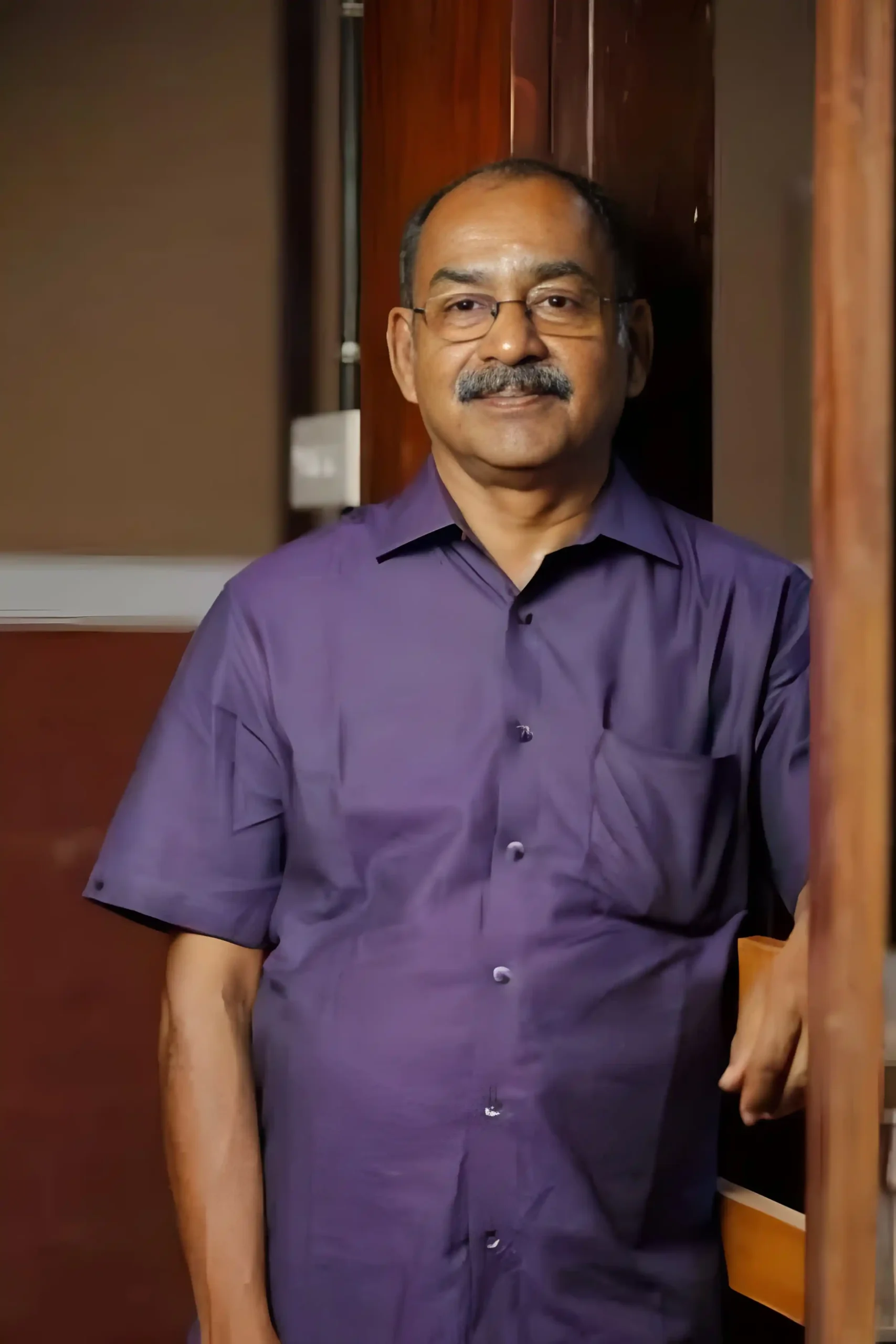 Ayurveda wellness client portrait for Karkidaka Chikitsa Package